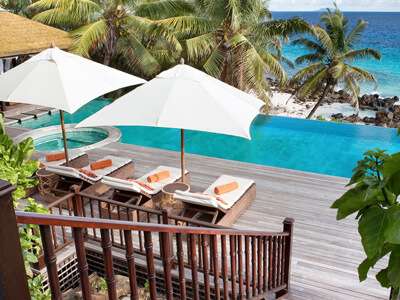 Fregate Island pool villa interior and pool deck