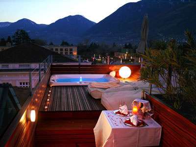 ImperialArt Hotel Meran Paradise Loft rooftop deck with jacuzzi at sunset