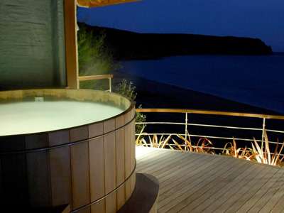 The Nare Hotel outdoor jacuzzi at night
