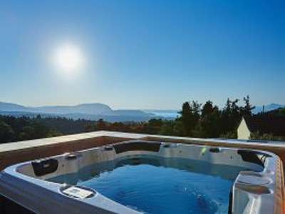 Villas Rouga rooftop jacuzzi at sunset