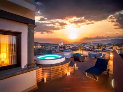 The Westin Excelsior Belvedere Suite terrace with jacuzzi at night